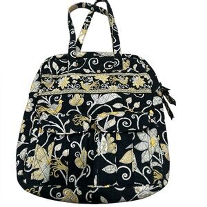 Vera Bradley retired quilted travel tote bag in the Yellow Bird pattern.